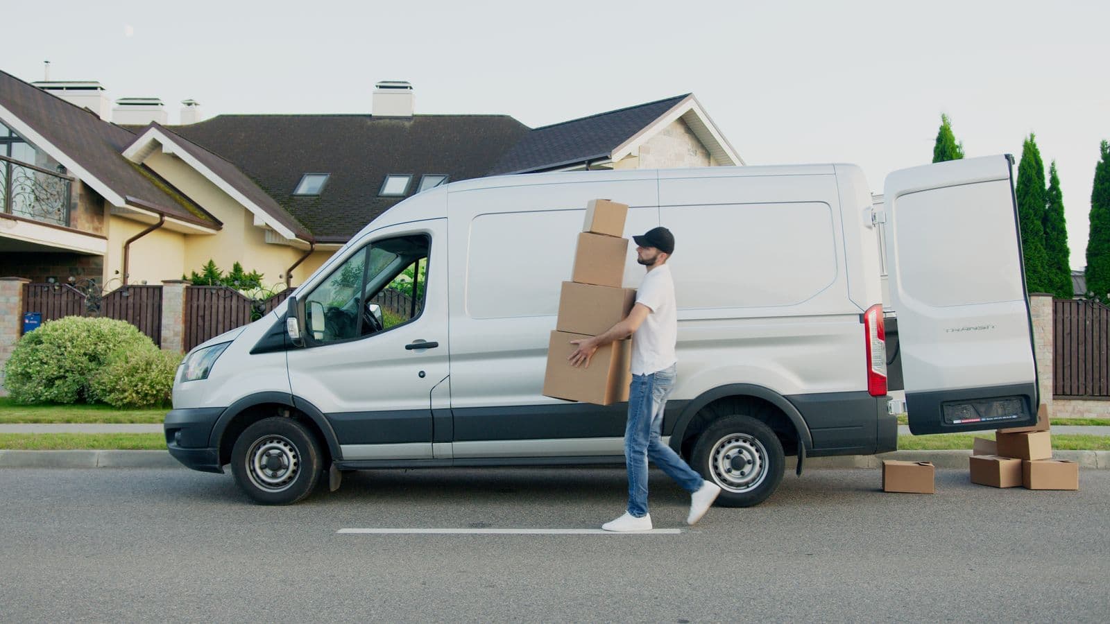 Cargo van on a residential street — illustrative stock